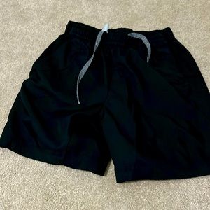 Boys Babolat tennis shorts.  Black.  Size 12-14